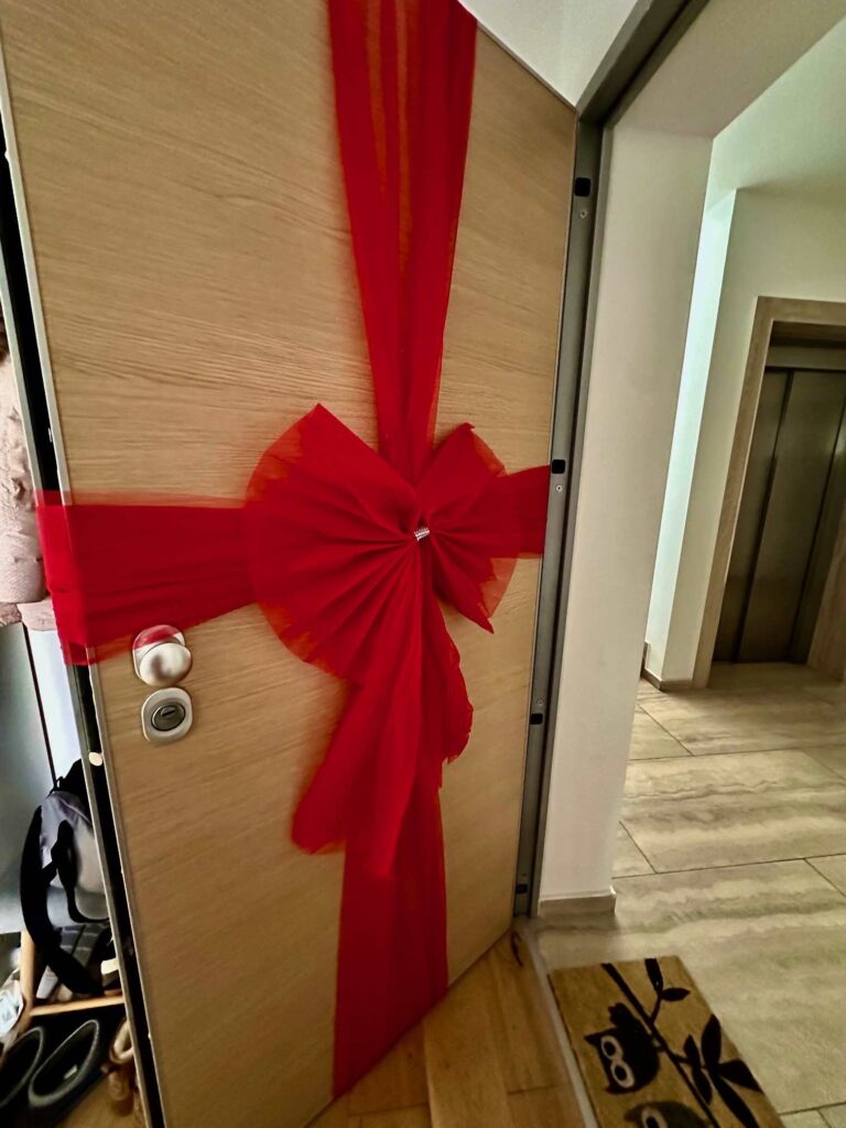 Christmas Bow Door Open