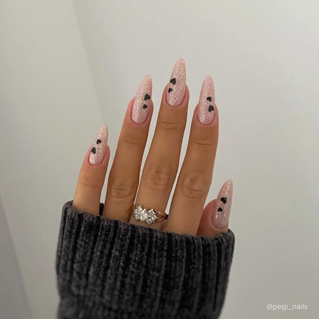 Black Hearts on Sparkly Nude Nails