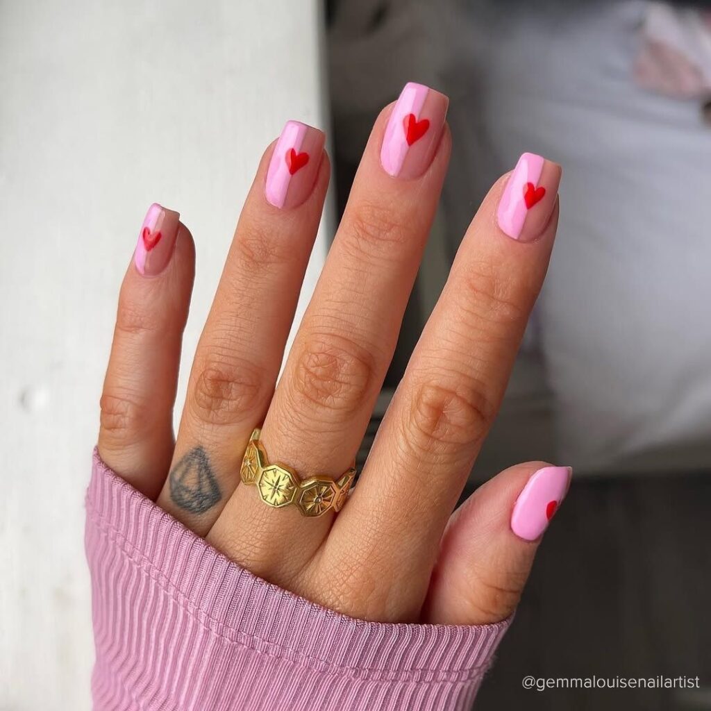 Red Hearts Symmetry on Pink and Nude nail design