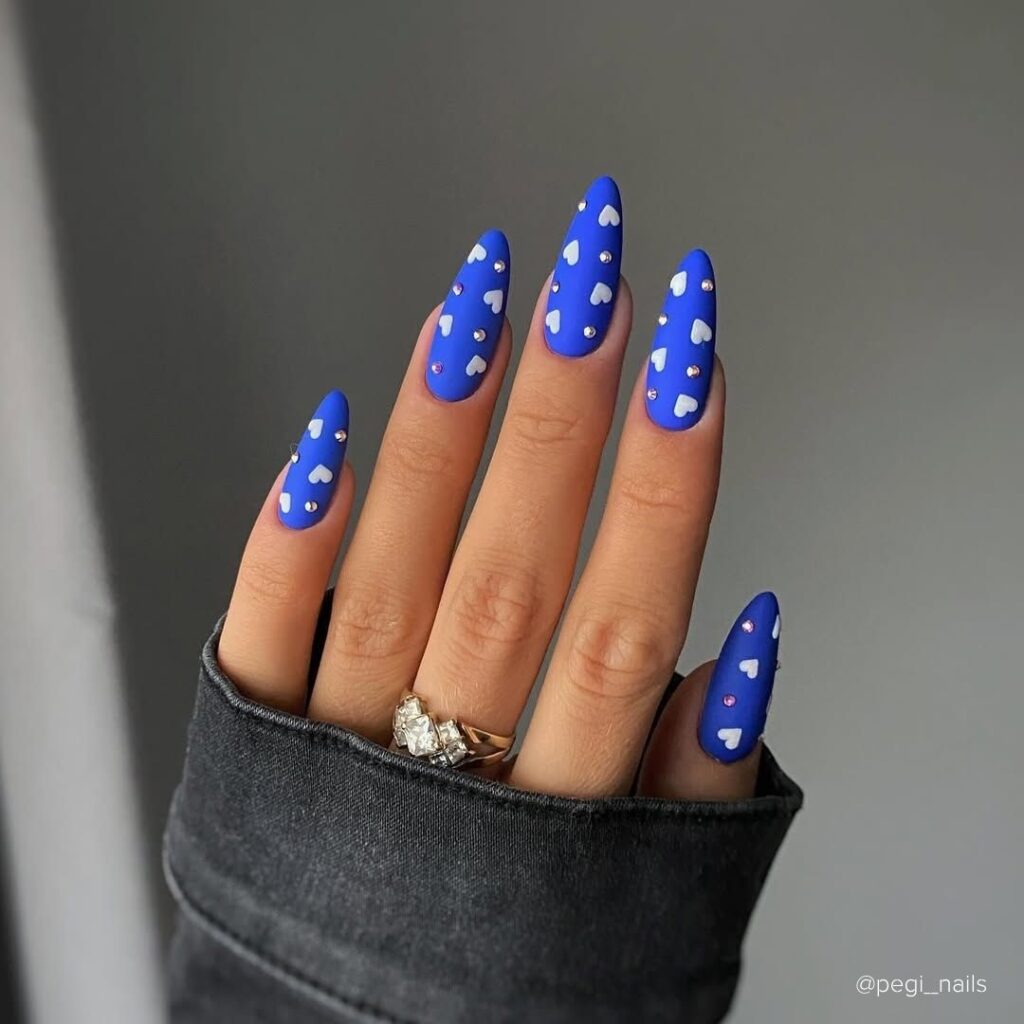 White Hearts and Diamonds on Matte Blue Nails