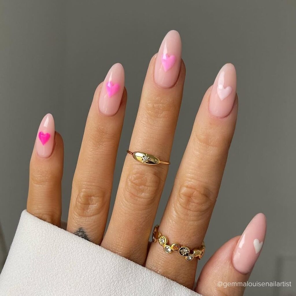 Gradient Pink Heart-Shaped Nail Design